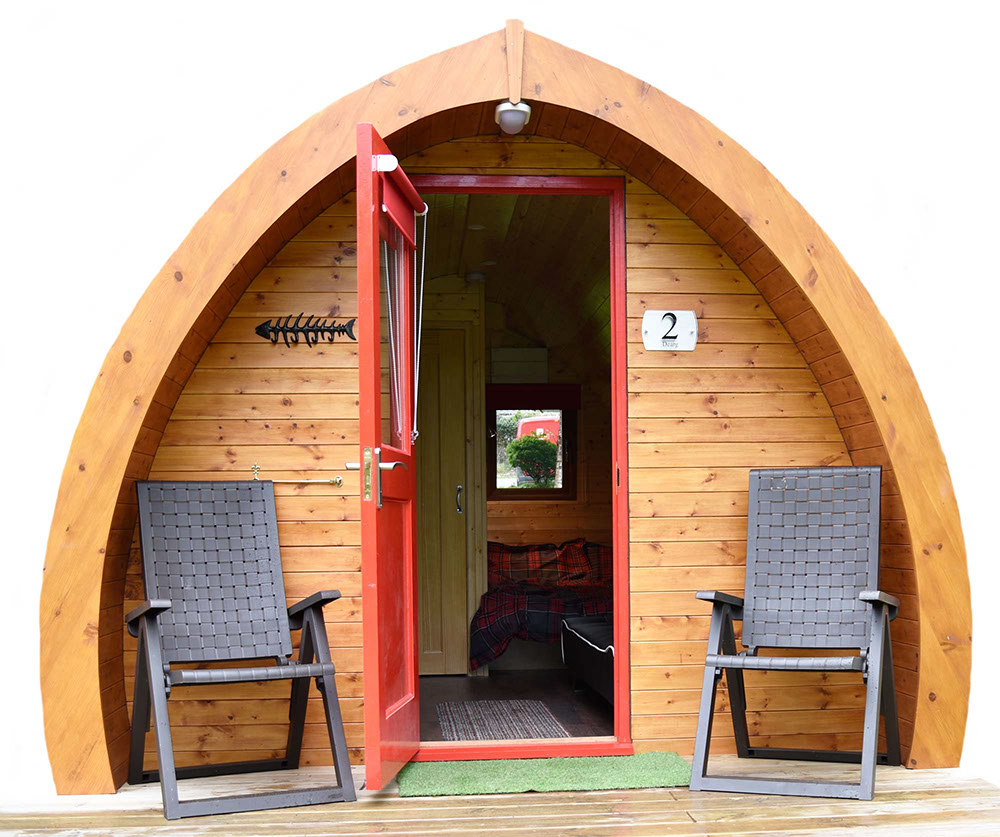 Dunvegan Camping Pod seating area with double bed and en suite