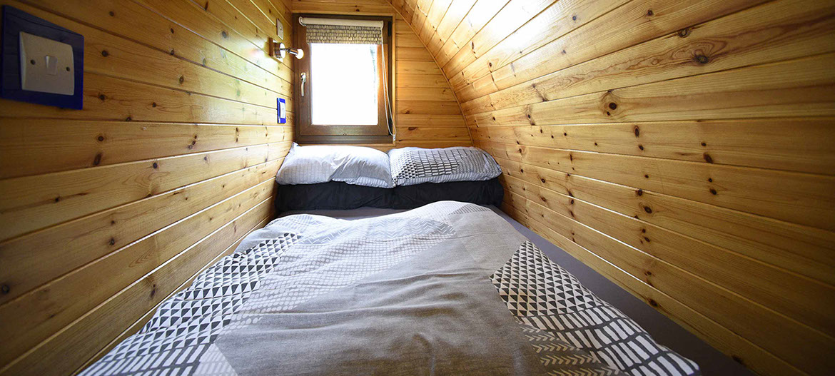 Our self catering Pods contain comfortable double beds with all bedding and linen provided