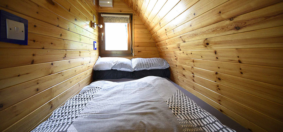 Our self catering Pods contain comfortable double beds with all bedding and linen provided