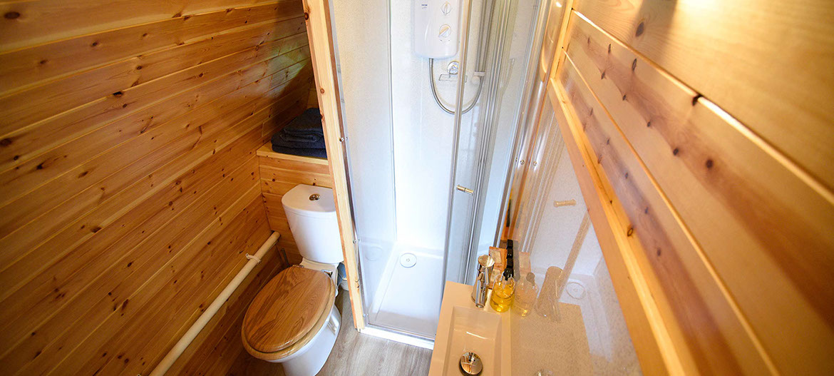 Self catering accommodation Pods in Dunvegan contain en suite shower rooms with powerful electric showers